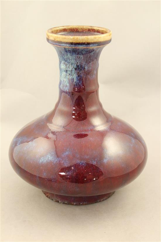 A Chinese flambe glazed bottle vase, Yongzheng mark but later, 26cm